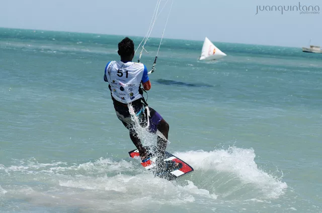 Professional kitesurfer jumping in Cabo de la Vela